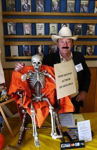 book signing with skeleton