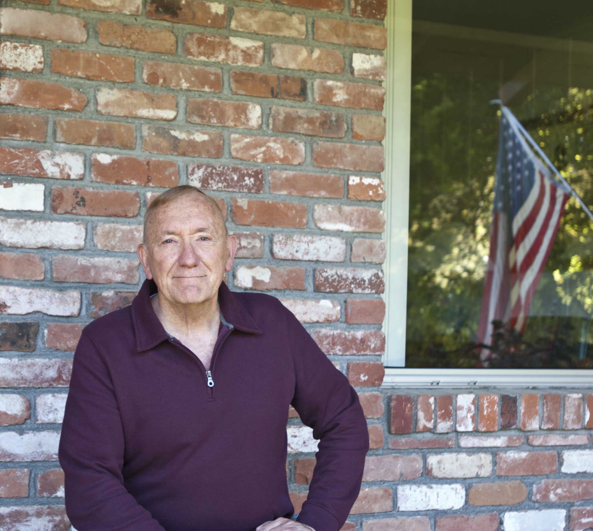 Author Ed Mitchell with American Flag